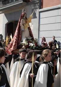 La Juventud Antoniana, con la Virgen, y La Borriquilla en la procesión del Domingo de Ramos